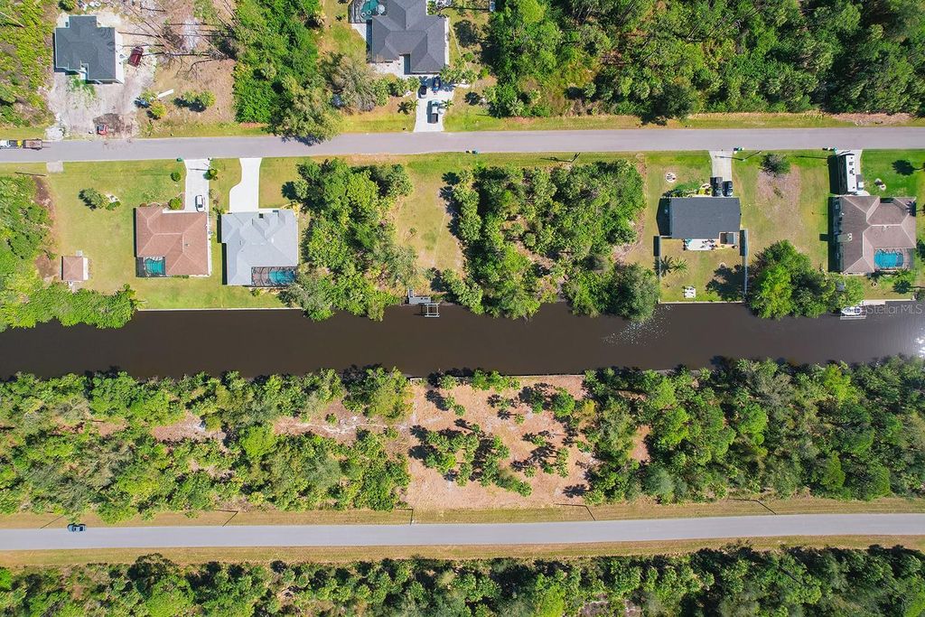 Photo of 496 Mcdill Drive, Port Charlotte, FL 33953 (MLS # TB8355847)