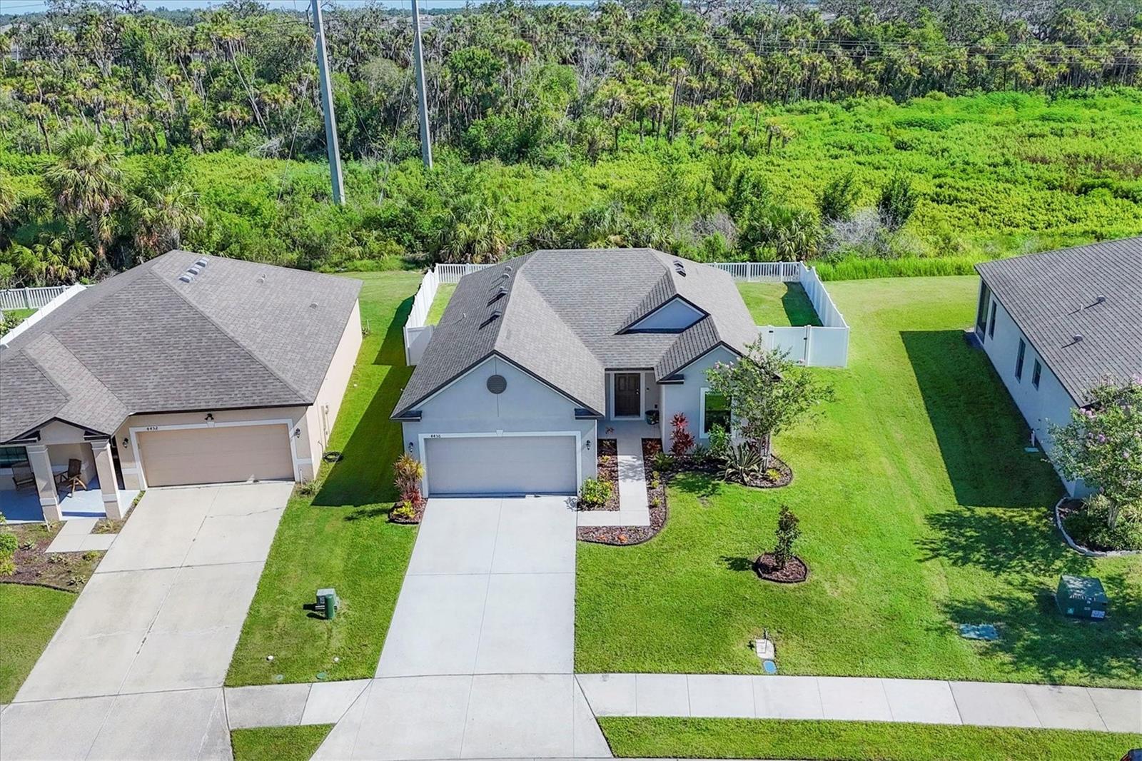 WONDERFUL WILLOW WALK! Welcome to this beautifully maintained Florida-style ranch home, tucked away in the tranquil and highly desirable Willow Walk community of Palmetto. Surrounded by lush tropical landscaping and backing to a serene conservation area, this residence offers an ideal blend of privacy, comfort, and thoughtful upgrades.
Step inside to an inviting, open-concept interior where stylish luxury vinyl plank flooring flows seamlessly through the main living spaces, while plush carpeting adds warmth to the private quarters. The kitchen is both elegant and functional, featuring gleaming granite countertops, stainless steel appliances, crisp white cabinetry, and a spacious island with seating—perfect for casual meals or entertaining guests.
The expansive primary suite is a true retreat, designed with elevated tray ceilings, a generously sized walk-in closet, and a beautifully appointed en suite bath with dual vanities and a tiled walk-in shower. Additional rooms offer versatile space ideal for guest accommodations, home office use, or a growing household.
Mosey through the sliding glass doors in your great room and into your private, fenced-in outdoor oasis. With no rear neighbors thanks to the conservation easement, you’ll find a peaceful setting for everyday relaxation—sit on your patio taking in the morning breeze whilst sipping on a cup of your favorite brew. The exterior is equally appealing with well-manicured landscaping and a wide driveway that leads to a spacious attached garage.
Living in Willow Walk means access to an array of resort-style amenities, including a walk-in pool, playgrounds, parks, and winding sidewalks for evening strolls. This prime location places you within walking distance of Ellenton Premium Outlets and close to a variety of shops, eateries, and world-renowned Gulf Coast beaches—all just a short drive away.
Whether you're seeking your very first home or a beautifully maintained seasonal getaway, this residence offers the Florida lifestyle you’ve been dreaming of.
(LINK TO 3D MATTERPORT TOUR: https://my.matterport.com/show/?m=BfnVEmujfX7&mls=1 )