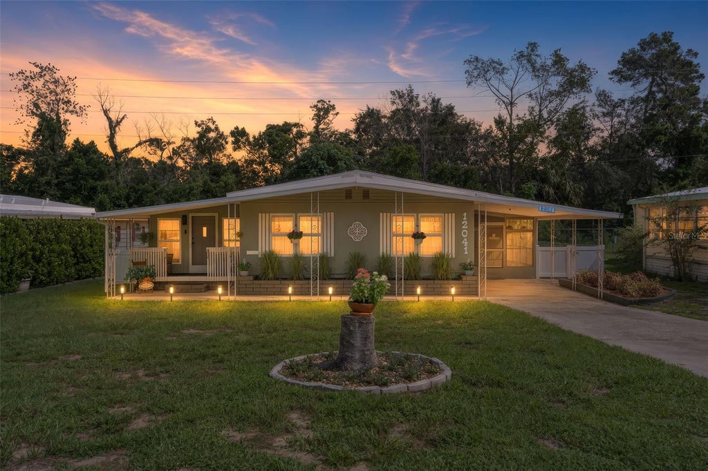Photo of 12041 Fairway Avenue, Brooksville, FL 34613 (MLS # TB8543694)