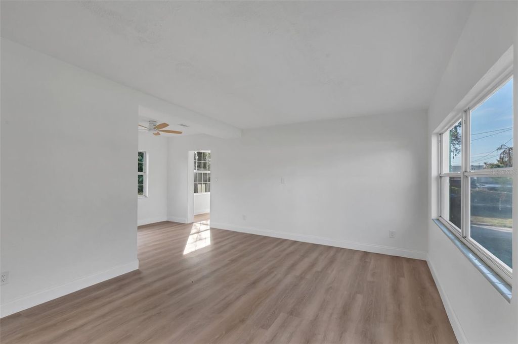 Photo of 833 Pinedale Avenue, Orlando, FL 32808 (MLS # OM716816)