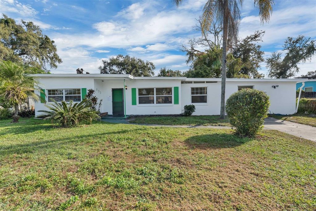 Photo of 833 Pinedale Avenue, Orlando, FL 32808 (MLS # OM716816)