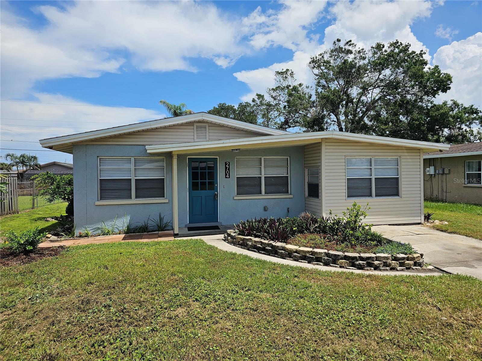BUYER IS IN FOR A TREAT! 3BR/1BA/ENTERTAINMENT ROOM/DECK. Newly renovated home. Kitchen has a new large farmhouse sink, new glossy push to open cabinets, quartz counter tops, new 5 burner glass top range, new range hood ducted to outside, new built-in microwave, new French double door refrigerator with icemaker and freezer on bottom. New Dishwasher. New Brick look porcelain tiled back splash. New Closet pantry. Laundry Room has new stack washer/dryer duet and built-in 7.5" tall storage cabinets for storage. New 40-gallon hot water heater. A/C is 3 yrs. old. Tile flooring throughout. 5 ceiling fans. Spacious Entertainment room has TGb Port in Wall. Attic is vented with wi-fi temperature control. Step out back onto large wood deck and extended pavers area perfect for cookouts with family and friends. Large backyard is partially fenced. House did not flood during last hurricane. Centrally located to Shop, Dine, Banks, Post Office, Entertainment, Park, Ellenton Outlet Mall, Downtown Palmetto, Downtown Bradenton, Beaches, St. Pete., Tampa, I-75 and points beyond. NO HOA AND NO CDD.