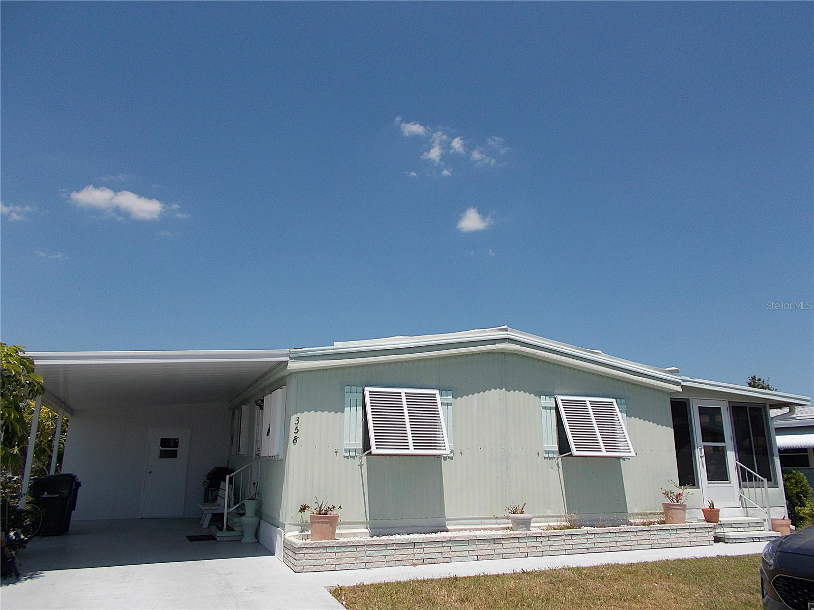 MOTIVATED SELLER! No need to spend another winter in the cold! This 2 bedroom, 2 bath home is being sold turn-key furnished! Features include a brand new shed with insulated paneled walls, open concept kitchen/dining/living room area and laminate through out with carpet found only in the bedrooms. Relax out in the Florida room with sliding windows to let in that beautiful sea breeze. Your furry family members are welcome, no matter their size! No weight restrictions, but breed & number limits apply. There's even a new dog park for them to enjoy! And there's plenty of enjoyment to be had for us humans too! Sandalwood Park offers a heated pool, shuffleboard court, putting green, seasonal entertainment, community get-togethers, happy hours on the patio and so much more! There's a reason why Sandalwood Park is so sought after! Come take a look today and make your offer!
