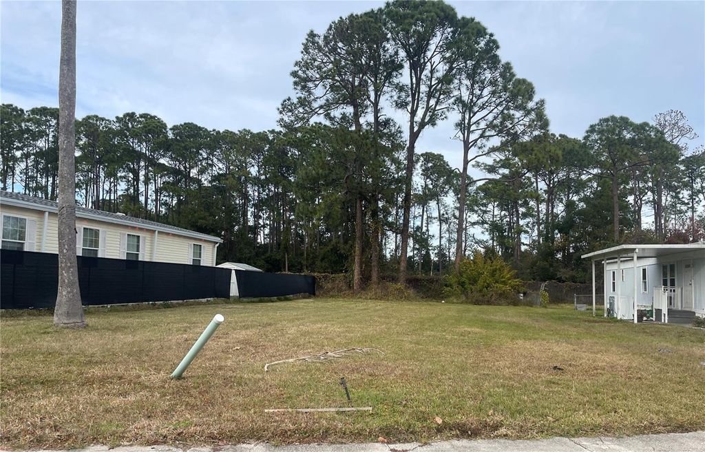 Photo of 13 Lawrence Court, Port Orange, FL 32127 (MLS # V4946927)