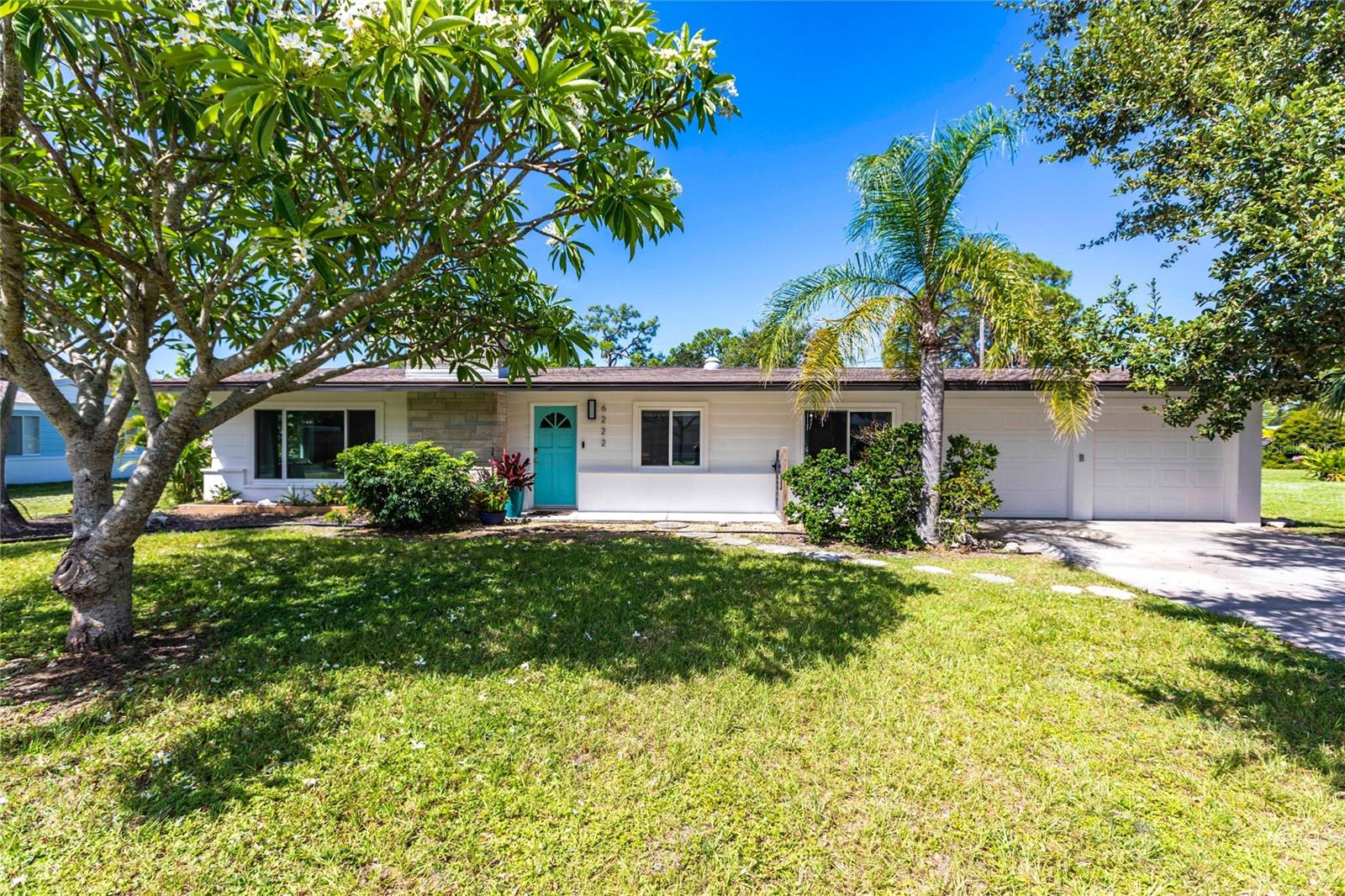 Fabulous single-family home located in lovely PINE SHORES ESTATES just a quick bike ride to beautiful SIESTA KEY BEACH & CRESENT BEACH & TURTLE BEACH. West of Tamiami Trail just a few blocks from Stickney Point Road and the ICW waterway. Spend your days living the beach life and walk across the bridge and hop on the SIESTA KEY TROLLEY to explore this world-renowned beach with its exceptionally fine, white sand made of 99% quartz. Enjoy all the delightful outdoor adventures including boating, para sailing, or even beach volleyball just a short distance from this pretty home. Feel like every day is a VACATION living here with tons of restaurants and shops within walking distance. This home shows like a dream with so many UPDATES including AC system 2023, New AC mini split for the office, roof 2018, new soffits and fascia, freshly painted inside & outside, updated windows with tint and impact resistant, both electrical panels are newer, and the closets are actual CEDAR CLOSETS. Classic traditional FLORIDA ranch home lives large with 2 spacious bedrooms and bathrooms plus several bonus rooms for home offices or exercise. Gorgeous large and private yard with plenty of room for the toys or a pool or extra storage, the current storage shed is huge and would make a wonderful mini office or guest cottage even. Wood burning fireplace is so nice for the chilly days in the cool season. Amazing value for a home located in this neighborhood! Easy to show!