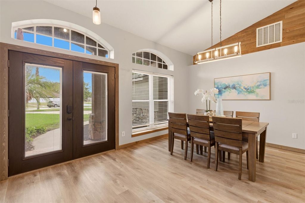 Photo of 1302 Pine Song Drive, Deltona, FL 32725 (MLS # O6409361)