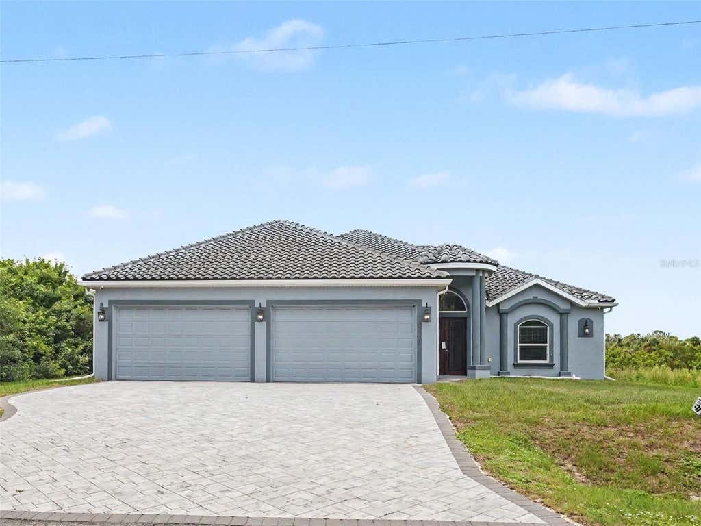 Photo of 2761 Newman Drive, North Port, FL 34288 (MLS # TB8540157)