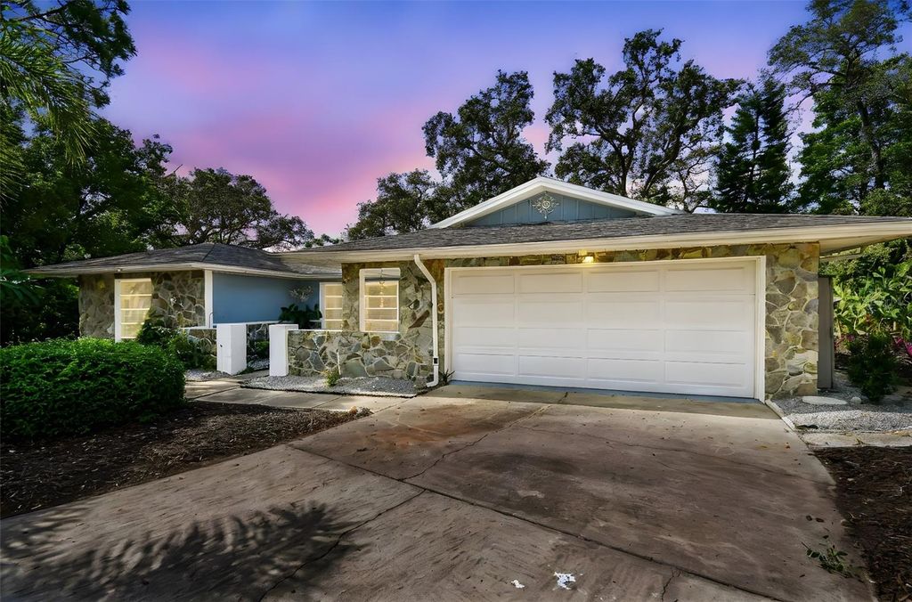 Photo of 1392 Burnt Oak Street, Tarpon Springs, FL 34689 (MLS # TB8407193)