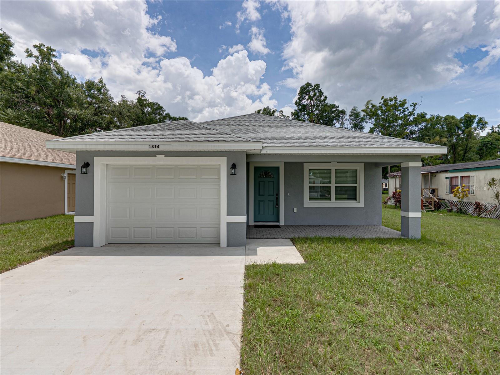 Welcome to this stunning newly built home nestled in a quiet neighborhood. This beautifully designed three bedroom, two bath residence offers modern finishes and thoughtful touches throughout. The kitchen and bathrooms feature elegant granite countertops, complemented by sleek stainless steel appliances that add a contemporary flair. Enjoy the beauty and durability of tiled surrounds in both bathrooms, along with stylish flooring that flows seamlessly through the kitchen and living area, perfect for entertaining. The open layout provides a comfortable and inviting atmosphere. Don't miss your chance to own this move-in ready home that combines quality craftsmanship with modern comfort.