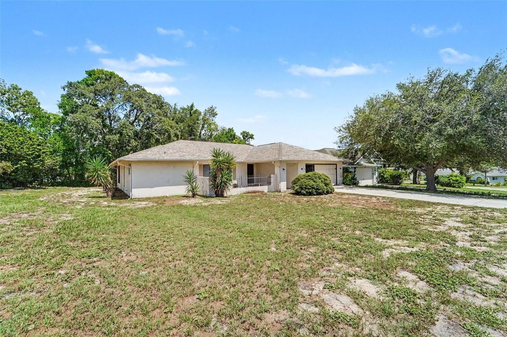 Photo of 4386 Craigdarragh Avenue, Spring Hill, FL 34606 (MLS # O6439787)