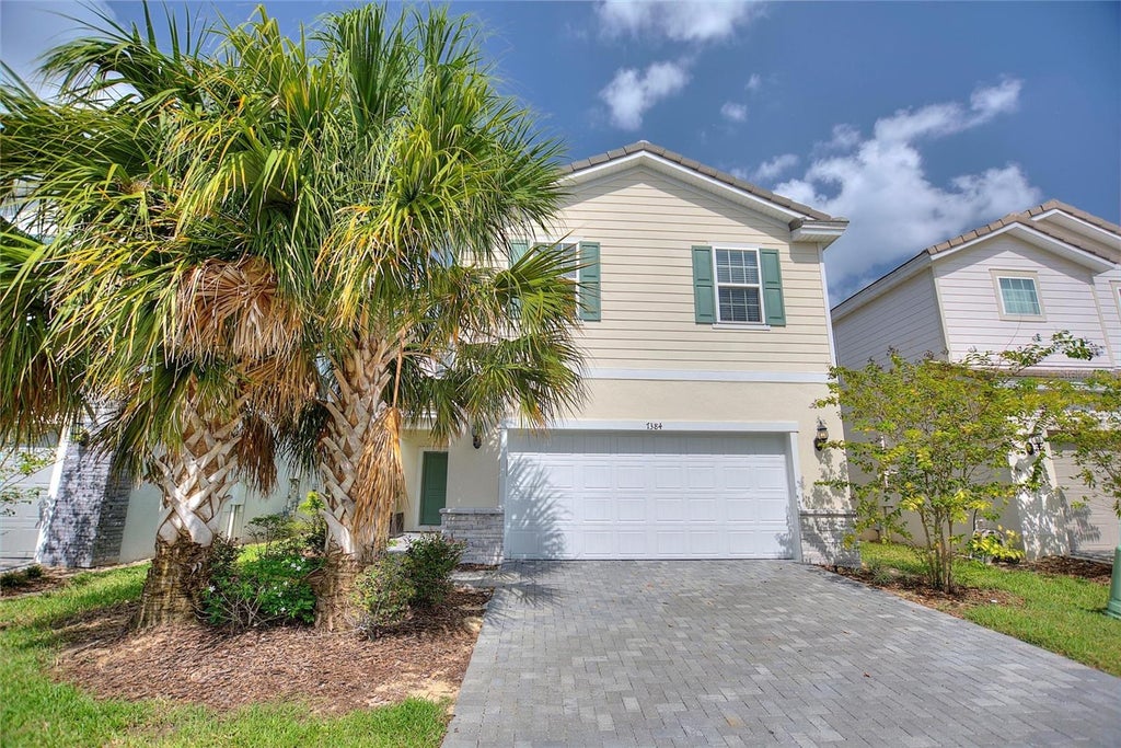 Photo of 7384 Oakmoss Loop, Davenport, FL 33837 (MLS # O6436661)