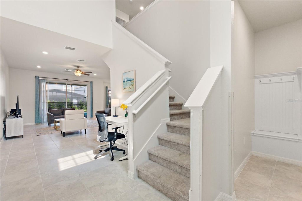 Photo of 7384 Oakmoss Loop, Davenport, FL 33837 (MLS # O6436661)