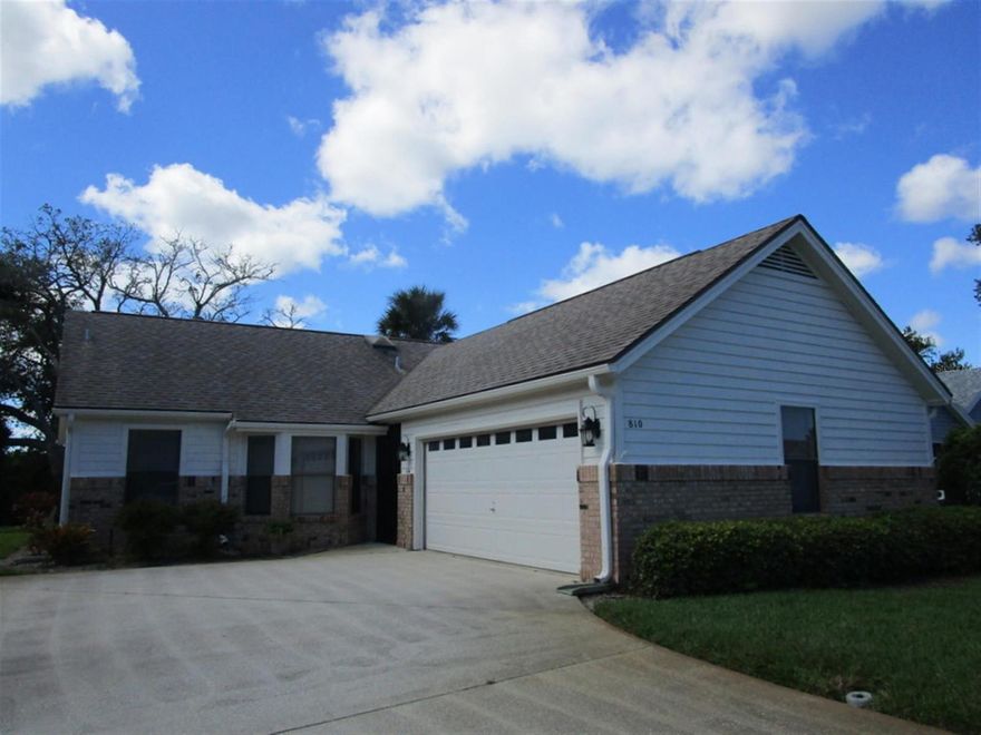 PRICE REDUCTION!!  It's rare that a direct canal-front home becomes available in the highly sought after community of Pine Island.  This home has 2 bedrooms and 2 baths in a split plan.  The large master bedroom has its own bath and a walk-in closet.  The spacious guest bedroom also has a walk-in closet.  There is a 2nd bathroom in the hallway.  The large living room flows into a den/study which looks out to the screened porch with a view of the canal all the way through the house.  The porch has vinyl sliders which can be moved in cool weather to allow the breeze to blow through.  The kitchen has pretty wood cabinets and a bay window area for breakfast or a coffee break.  The dining room has a nice view to the beautiful back yard.  There are lots of windows which makes the home open and bright with natural light.   The front entrance has a covered entryway which you enter from the driveway or the garage - great for bringing in groceries on a rainy day.  The low HOA fees give you use of a community pool and a club house.  But, your favorite place to be will be the quiet, peaceful back yard under a shade tree looking at the tidal canal that leads to Turnbull Bay.  Enjoy the wildlife, water view and peacefulness.  You must see this home to fully appreciate all it has to offer. Easy to show, owner motivated! ;Water: City