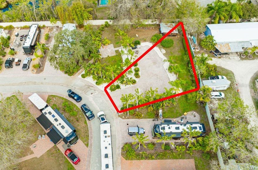 Exclusive Developer Closeout – Oversized Corner Lot in Premier Clothing-Optional RV Community.  
This is your final opportunity to own an oversized exterior corner lot in one of the most sought-after clothing-optional, gated RV communities in Florida! Located at 6861 Amanda Vista Circle in Land O' Lakes, this private and serene lot offers the perfect setting for your RV retreat, featuring brick pavers and lush tropical landscaping with palm trees. It’s the ideal spot to relax, unwind, and enjoy the privacy you desire, all within a vibrant and welcoming community.  This lot has a 100 amp full hookup and Verizon fiber optic is available at the street.
For those looking to maximize their space, this lot can be combined with the adjacent 6857 Amanda Vista Circle, creating a huge private estate—a rare find in this exclusive community! Just steps away from the clubhouse with two pools, a hot tub, tiki bar, and dog park, you’ll have access to top-notch amenities to elevate your lifestyle.
The location is unbeatable, with Caliente Resort next door and other clothing-optional lifestyle destinations nearby. Caliente is just a golf cart drive away and offers a variety of membership options.  Plus, you’ll be close to golf courses, shopping, restaurants, and the airport, making it easy to enjoy everything the area has to offer.
With the developer’s closeout underway, this is your last chance to secure one of the most private and expansive lots in this premier community.