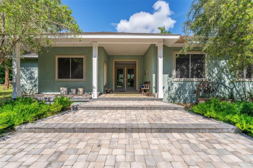 PRICE REDUCED!!! Welcome to a one-of-a-kind, multi-use estate sprawling across 5.4 acres of turnkey farmland and commercial space. The heart of the property is a concrete-block three bedroom two bathroom residence, with foam-filled block and meticulously energy-sealed with double-pane windows and doors. Inside, an integrated speaker system flows through two bedrooms, the master bath, kitchen, dining room, and back patio—perfect for seamless indoor-outdoor entertaining. New roof will be installed prior to closing
Step outside into a 2,300 sq ft screened enclosure featuring a 12' × 24' inground saltwater pool, then explore the fully fenced grounds complete with a gated, remote-controlled entry for ultimate privacy. Agricultural and industrial operators will appreciate the 22 greenhouses—multiple wells and septic tanks—and a 40' × 108' warehouse ideal for processing, storage, or workshop use. The main home enjoys its own well plus dual septic systems, ensuring robust water and wastewater capacity.
Located just minutes from shopping, dining, and quick access to the 429, this property offers the perfect balance of rural tranquility and urban convenience. Whether you’re growing, manufacturing, or simply seeking expansive acreage with premium amenities, this estate delivers unparalleled flexibility and value.