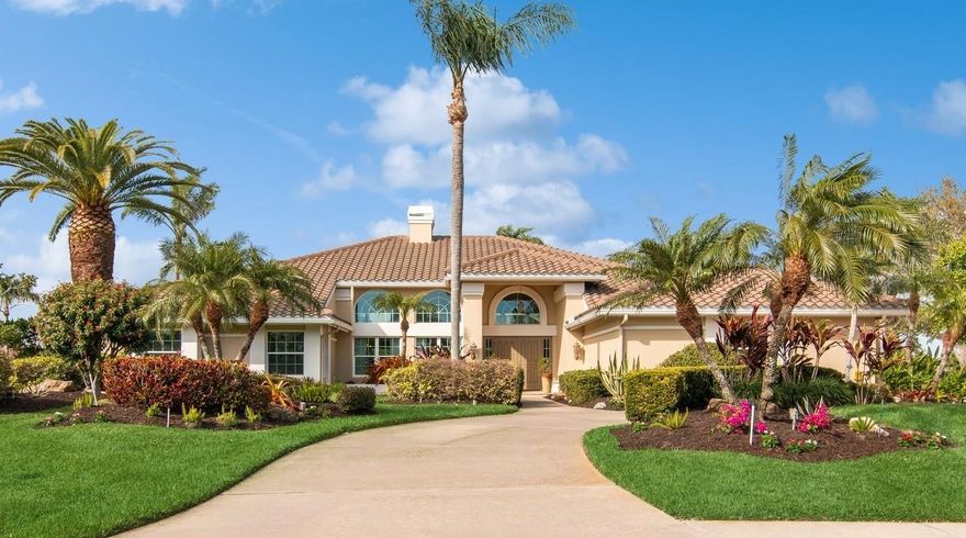 Nestled within the TPC Prestancia Golf and Social Club, this immaculate property offers unparalleled luxury living with 3 bedrooms, an office and oversized living areas. Situated on an expansive lot, this residence provides an exceptional quality of life in a serene setting with breathtaking views. As you enter through the grand foyer, you’re greeted by a spacious floor plan boasting high ceilings and abundant natural light as each room is open to the outdoors. Exquisite touch of architectural details, including a stunning curved wall adds a touch of elegance to the living room and dining room. A cozy gas fireplace and a wet bar conveniently separate the living and dining rooms, creating an ideal space for entertaining guests. The gourmet kitchen, open to the spacious family room, is thoughtfully designed with panoramic views of two tranquil ponds and the greenery of the golf course, creating a picturesque backdrop to inspire your culinary creativity! The living areas seamlessly flow to the outdoor oasis, where a newer resort-style pool and spa await. Outdoor living here is a dream with different areas to welcome your friends, to enjoy an Al Fresco dinner or simply to relax. An outdoor kitchen and pool bath complete this oasis, with gorgeous travertine on the floor, enclosed by a high wind-resistant pool cage, ensuring durability and safety. The master suite is a serene retreat, offering a spacious bedroom, large walk-in closets and an additional area perfect for reading, meditation or for your personal gym. 
The office with built-in bookshelves sits just on the side of the Master bedroom as well as the guest powder room. The two guests’ bedrooms and bathroom are located on the other side of the house for privacy. An oversized three-car garage with plenty of storage completes the property. With costal windows and sliding doors, only seven years old tile roof, 2 AC units (2020,2023) and two water heaters (2018, 2023), this home gives you the peace of mind to live your life fully. TPC Prestancia offers several membership options, including access to two 18 golf courses and a restaurant, although they are not mandatory for residents. Conveniently located just minutes away from downtown Sarasota and downtown Venice, with proximity to Siesta Key, renowned for its beautiful beaches, and shopping areas, this home offers the perfect blend of luxury and convenience. Schedule your private showing today and discover this elegant property on one of the best addresses of Palmer Ranch, Sarasota.