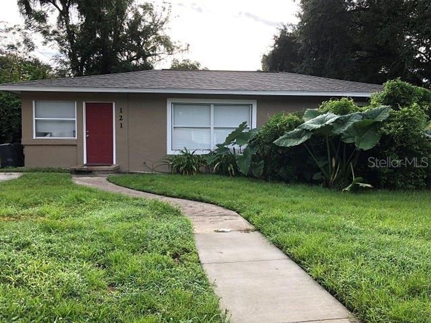 A MUST SEE! Beautifully remodeled 3 bedroom 2 bath home. This is a two bedroom and one bath in the front with a one bedroom one bath mother-in-law suite in the back, off of the laundry room with its own entrance as well. Main house has a large foyer and living room.  Kitchen has beautiful cabinets and granite counter tops. Septic system was just replaced in September. Currently rented for $2,000 per month. Lease ends February 28, 2026. Close to everything.