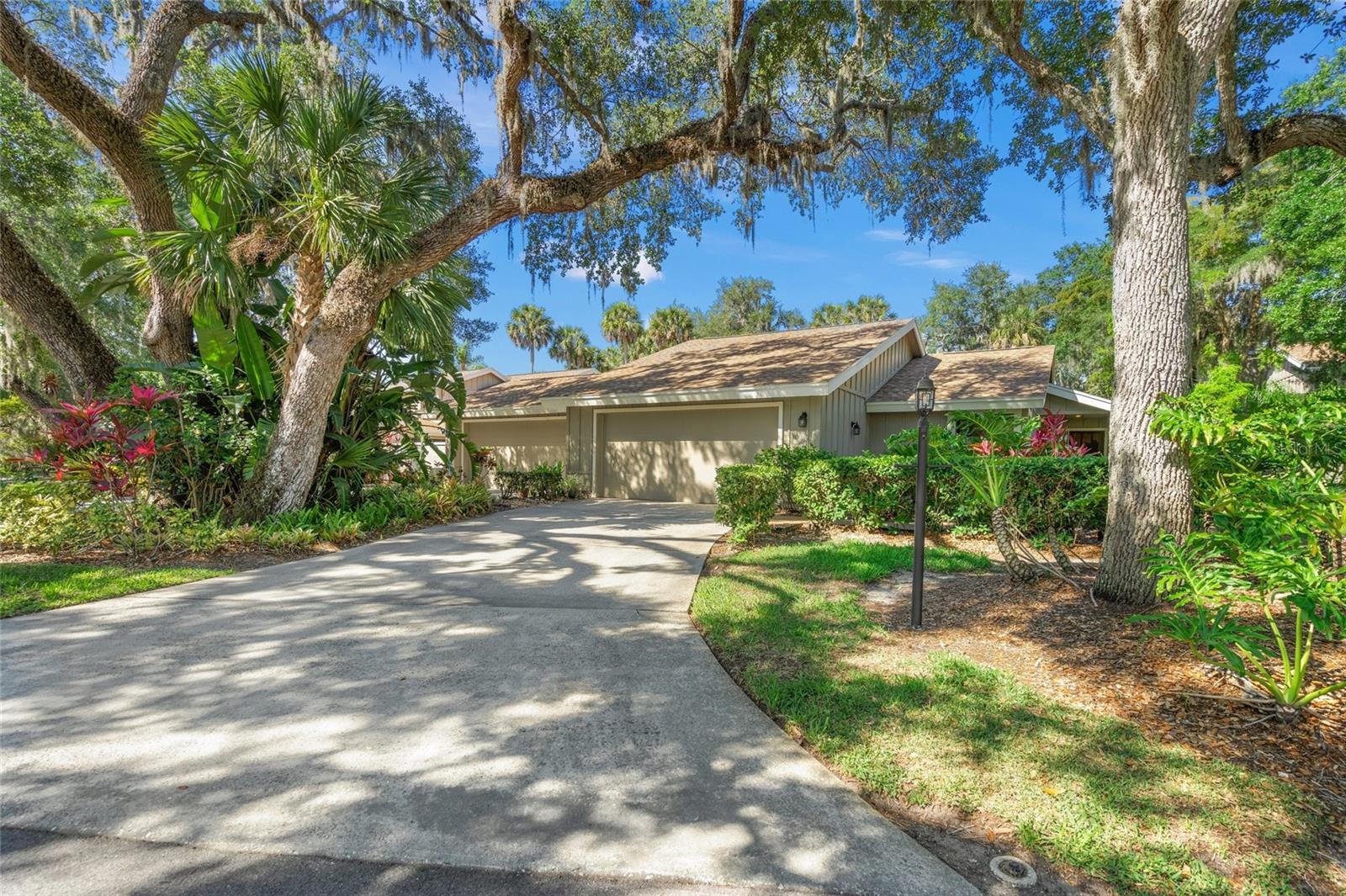 Highly Motivated Seller!!! Welcome home to this beautiful 3 bedroom, 2 bath end unit villa located in sought after community of Hammocks II in Bent Tree! Hammocks II is an active 55+ gated community with lush landscaping and beautiful Oak Trees, winding streets perfect for a morning walk or bike ride. This open floor plan villa has over 1700 sq ft of living space with formal living/dining rooms (no step-down areas) and a separate family room off the kitchen, great for entertaining. Den is ideal for 3rd bedroom, just by adding a small wall , door and to take a closet from the second bedroom. This home is light and bright with LVP flooring thru out! Enjoy a cup of coffee in your screened in lanai off the family room that overlooks a beautiful landscaped green space, with separate concrete patio. Relax in your Primary suite with large walk-in closet. Enjoy the community pool that is in walking distance. This home is being sold turnkey furnish, all you need to bring is your personal items. This community is located within minutes to shopping, restaurants and approx. 20 minutes to the beautiful Siesta Key Beaches. New Shingle & Flat Roof (4/2024) AC 2018