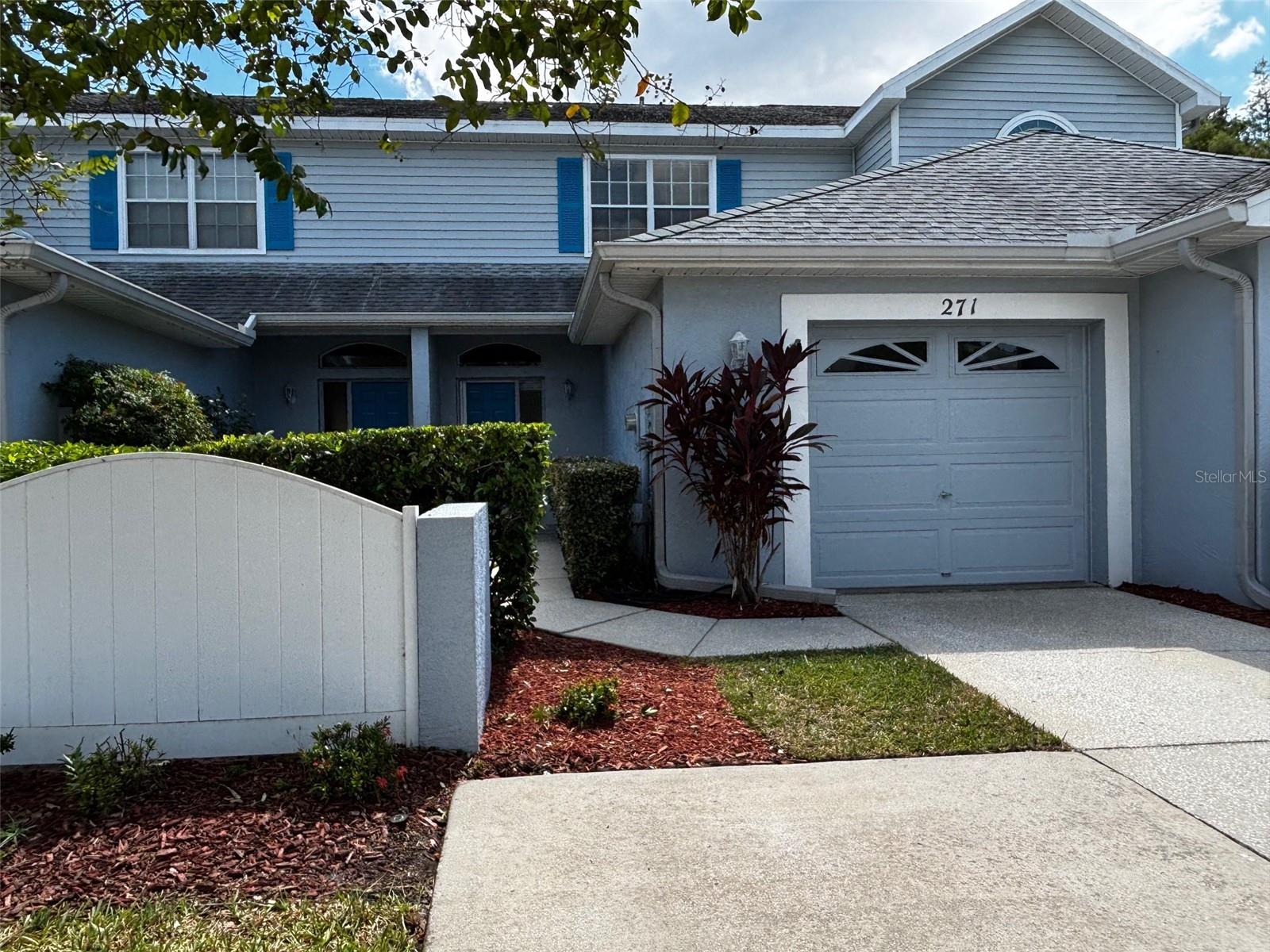 One or more photo(s) has been virtually staged. Welcome to this inviting 3-bedroom, 2.5-bath townhome with private garage, perfectly set in the quaint Oldsmar community of Sun Ketch Townhomes of Cypress Lakes. Step inside to find brand-new luxury vinyl plank flooring and a bright, open layout. The spacious great room features sliding glass doors leading to a sunroom, expanding your living area while offering serene views of the premier conservation lot. The kitchen is both functional and stylish, with white cabinetry, solid-surface countertops, tile flooring, a breakfast bar and a closet pantry. For added convenience, the inside laundry room—complete with full-size Bosch washer and dryer—is located just off the kitchen. Upstairs, the primary suite impresses with vaulted ceilings, a walk-in closet and a private bath, while the additional bedrooms are well-sized for family, guests, or office space. Enjoy the saltwater, community pool, a low HOA fee of only $240 per month and the unbeatable location! Oldsmar is the gateway to Tampa, offering easy access to shopping, dining, parks, Tampa Skating Academy, and highly rated schools including Forest Lakes Elementary, Carwise Middle, and East Lake High. Plus, Tampa International Airport is less than 30 minutes away!