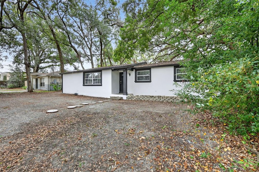 Photo of 709 E Crenshaw Street, Tampa, FL 33604 (MLS # TB8468083)