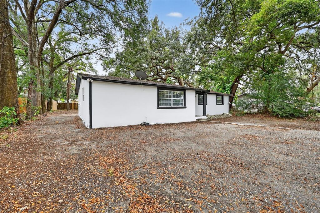 Photo of 709 E Crenshaw Street, Tampa, FL 33604 (MLS # TB8468083)