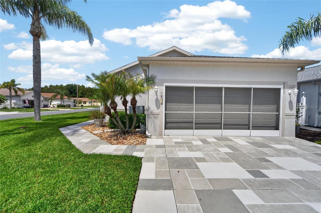 Photo of 8403 Tarocco Court, Land O Lakes, FL 34637 (MLS # TB8557310)