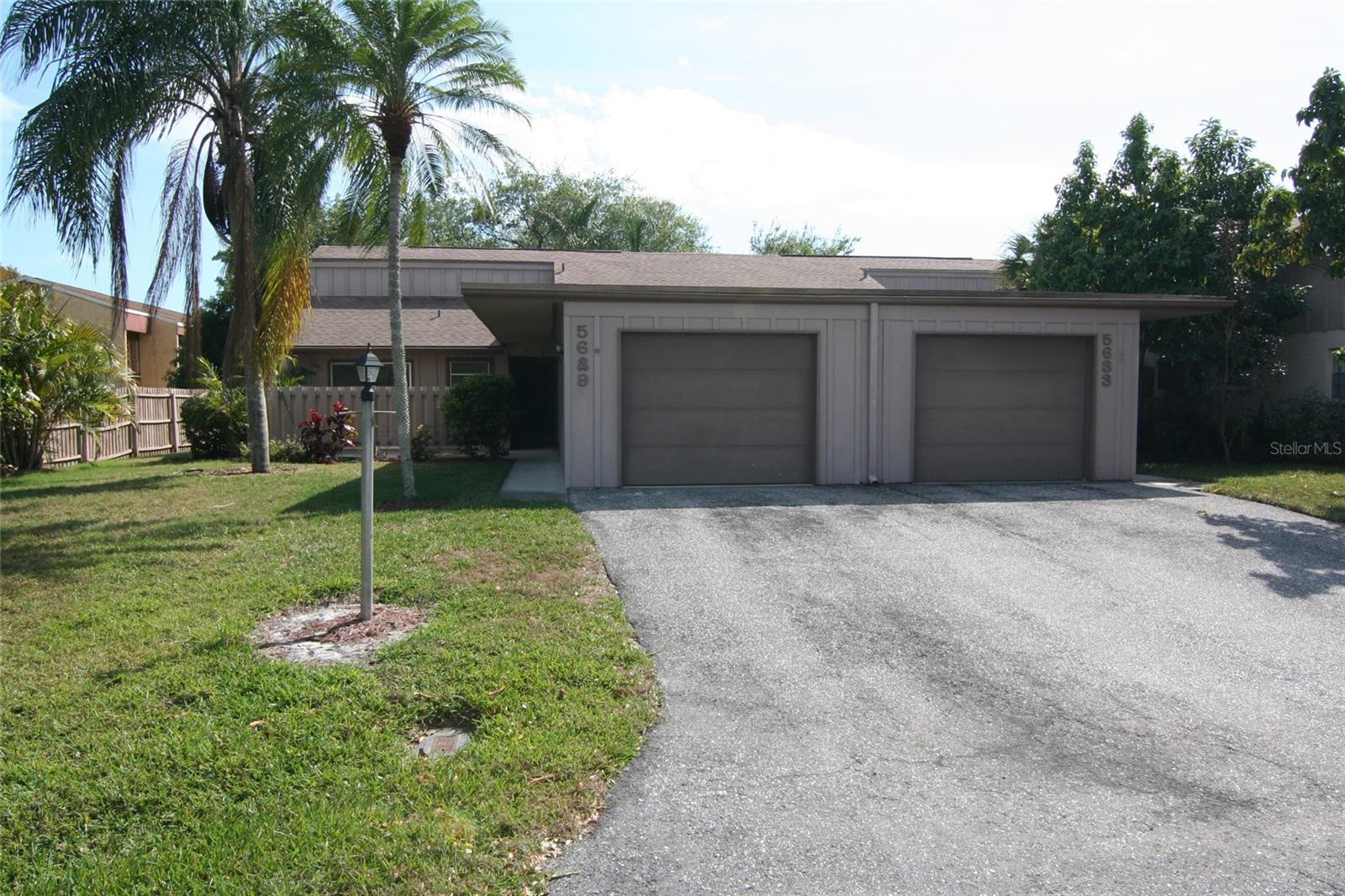 Villa Gardens is a quaint community located off of Clark Road near Beneva, just 3 miles to Siesta Key beach. This Villa (end unit) is well maintained and ready for move in. Property features include: renovated kitchen and baths, volume ceilings, wood laminate and ceramic tile throughout, new stainless steel kitchen appliances, gorgeous new cabinetry and granite counters and so much more. The screened and covered lanai provides a view of the expansive rear lawn and backs up to the community pool and clubhouse. One small dog (under 35 lbs) is permitted with a $300 non refundable pet fee. Community application ($100) requires 15 days processing time.