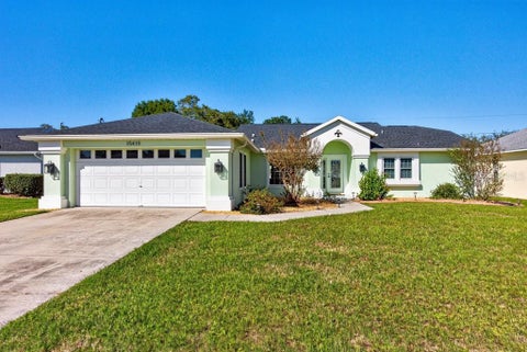 Photo of 15419 Arvin Drive, Brooksville, FL 34604 (MLS # TB8561118)