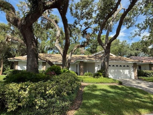 Discover the perfect blend of comfort, style, and community in this beautifully maintained 3-bedroom, 2-bath single-family home, tucked within the picturesque, gated enclave of Garden Lakes. This free-standing residence offers the ease of maintenance-free living paired with the privacy and charm of a traditional home. Step inside to the spacious living and dining areas flowing seamlessly into a versatile Florida room—ideal for a home office, hobby space, or quiet retreat. The well-designed layout makes everyday living and entertaining a breeze. Outside, you’ll love the oversized, landscaped courtyard surrounded by mature oak trees—a peaceful spot for your morning coffee or evening unwind. Garden Lakes is known for its serene, tree-lined streets and resort-style amenities, including a heated pool, modern clubhouse with kitchen, fitness center, library, tennis, pickleball, shuffleboard, and scenic walking paths. With a vibrant calendar of social events, it’s easy to feel right at home in this friendly, active community. Centrally located near top shopping, dining, and entertainment—just minutes to University Town Center, Sarasota’s cultural attractions, medical facilities, and the sparkling Gulf Coast beaches—this home is truly a gateway to the Florida lifestyle you’ve been dreaming of. Don’t miss this opportunity to own a slice of paradise—schedule your private tour today!