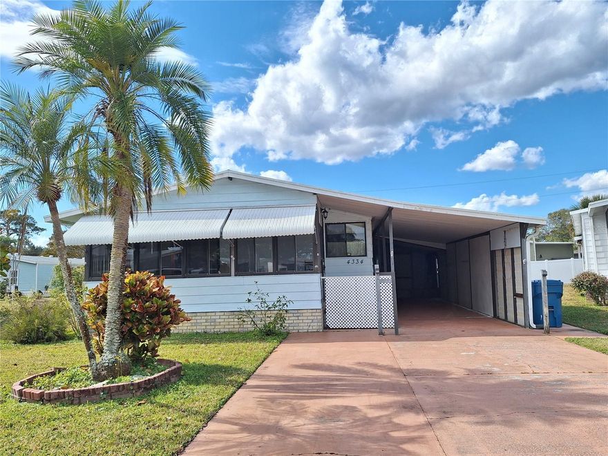 Welcome to Terra Mar Village, "Where The Land Meets The Sea" You own not only the home, but also your OWN LAND in this Riverfront Community nestled along the Indian River Intracoastal Waterway! This 2BR 2BA manufactured home is being offered partially Furnished, featuring original charm and has been lovingly cared for. Situated on a cul-de-sac with a wide driveway plus a Deep 29'x11' carport where you could back your smaller boat right in or park your car under cover. Sunny and nice size Front enclosed porch, which brings you into the spacious living room. Newer flooring in living area, dining room, hall and bedroom. Kitchen has a breakfast bar and a pantry. The Dining room built-in gives you plenty of additional storage. Primary suite is oversized with lots of windows and has a walk in closet. Dual sinks in the ensuite bathroom plus a stand up shower. 2nd BR has a walk in closet too! Convenient Inside laundry room has washer & dryer and a built in desk, and offers access to screened porch area with a workshop. Out back is a fully fenced yard, covered patio and another storage shed which also houses the irrigation system. Window awnings provide hurricane protection as well as a hurricane strap for carport for peace of mind. Pie shaped lot and easy to maintain. Make this home yours for a seasonal escape or enjoy full time! In Terra Mar Village You pay just a monthly amenity fee which covers maintaining 2 swimming pools (1 is heated year round), community boat ramp, fishing pier, large clubhouse that has tons of social activities, shuffleboard and more! Also, for a fee, Terra Mar Village offers boat slip leases and RV/boat/trailer storage! Fish & Boat your heart out in the Indian River and enjoy the RIVER LIFE!! All measurements are approximate and all information is deemed accurate and should be verified.