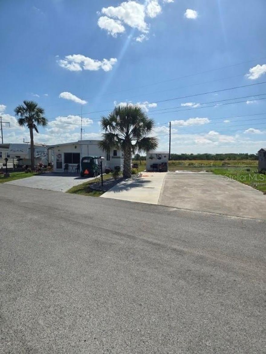 Escape to your own slice of Florida paradise! This spacious vacant lot at 4669 W Palm Dr, Bowling Green, FL 33834 is already outfitted for RV occupancy, making it the perfect turnkey setup for your seasonal getaway, weekend retreat, or full-time RV lifestyle. Situated in a peaceful 55+ community, the property offers easy access to utilities and plenty of room to relax under the Florida sunshine. Whether you’re looking for a private escape or an investment opportunity, this ready-to-use RV lot offers flexibility, freedom, and convenience. Just bring your RV and start enjoying the laid-back Florida lifestyle today!

Buyer and Buyer's Agent to verify all association rules, fees, restrictions, and other related details directly with the association.