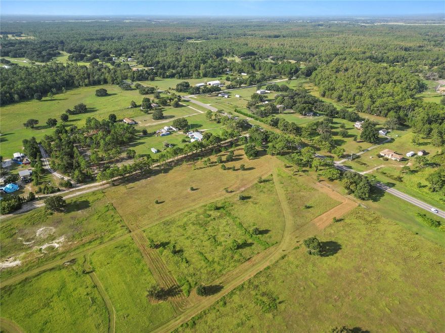 Step into the possibilities of this stunning 2.49-acre property, a perfect blend of opportunity and tranquility. Nestled in the coveted Flood Zone X, this land is high, dry, and mostly cleared, setting the stage for your next chapter. Whether you dream of building a one-of-a-kind home, creating a peaceful homestead, or investing in a slice of Central Florida’s natural beauty, this property offers the ideal foundation.

Make this a serene and private location, this parcel combines the quiet of rural living with the convenience of modern connectivity. Its proximity to Highway 27 and I-4 ensures effortless travel to Orlando, Disney, and Tampa, making it an excellent choice for those seeking both accessibility and escape.

The potential here is as vast as the land itself—imagine crafting your dream retreat, complete with lush gardens, outdoor spaces for entertaining, or perhaps a small-scale hobby farm. With its ready-to-build landscape and the security of being in a high and dry area, this property offers a rare chance to bring your vision to life with ease.

Take hold of this exceptional opportunity today. Adjacent parcels are also on the market, making it possible to expand your vision to encompass over 7 acres of endless potential. This is more than land—it’s the starting point of your future.