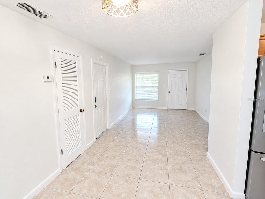 Photo of 336 Greens End Street, Orlando, FL 32810 (MLS # O6446740)