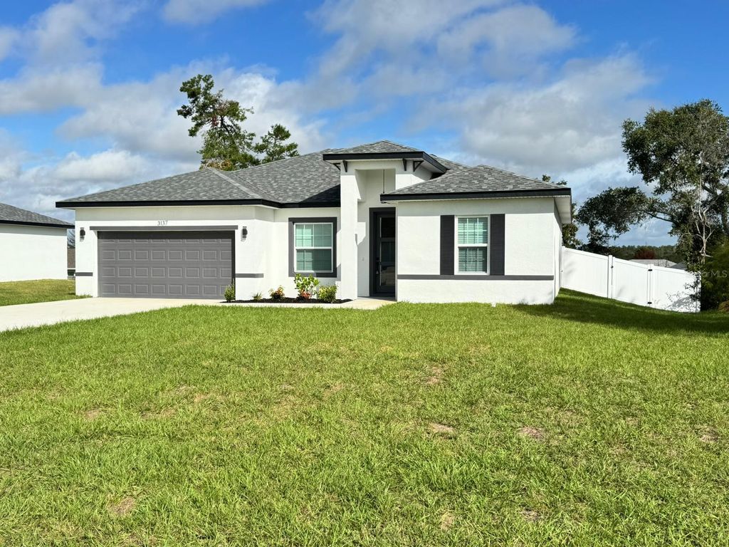 Photo of 3137 SW 127th Lane Road, Ocala, FL 34473 (MLS # OM712011)