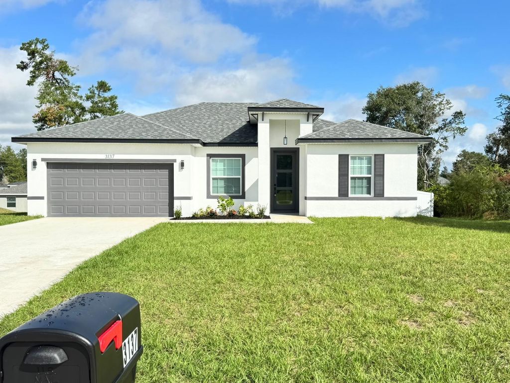 Photo of 3137 SW 127th Lane Road, Ocala, FL 34473 (MLS # OM712011)