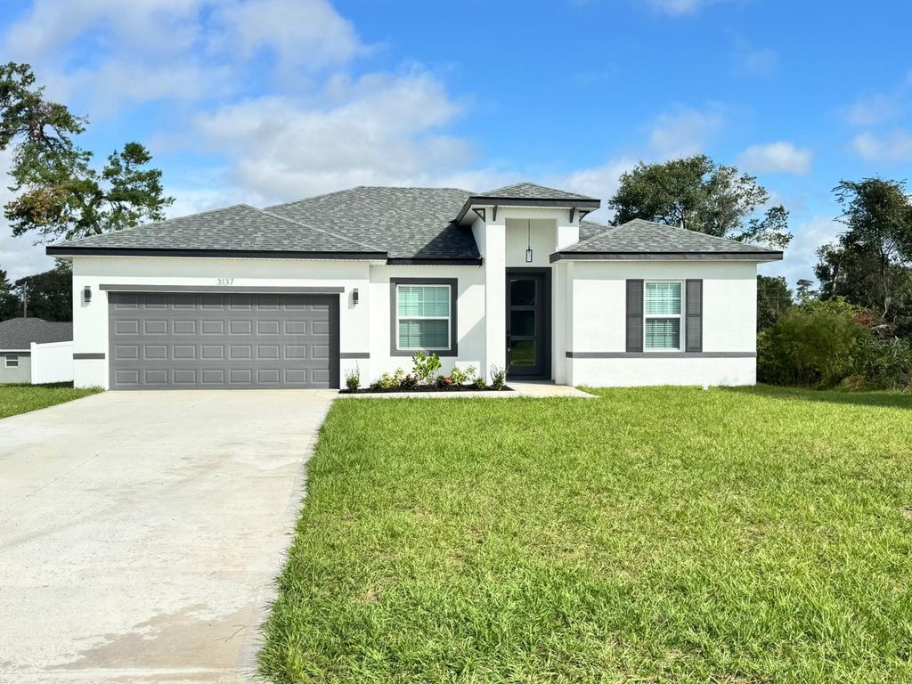 Photo of 3137 SW 127th Lane Road, Ocala, FL 34473 (MLS # OM712011)