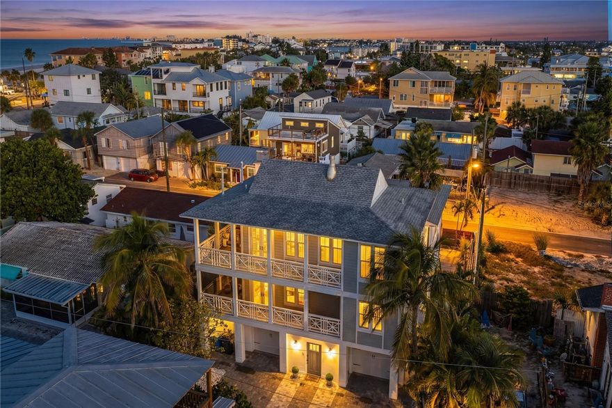 LIVE IN THE HEART OF WORLD-FAMOUS SUNSET BEACH!
This beautifully customized coastal residence offers a rare opportunity to own in one of Florida’s most coveted beach communities—where sugar-soft sand, nightly sunsets, and relaxed island living define everyday life. Ideal as a luxury primary home, vacation retreat, or high-demand rental, this prime location delivers the ultimate coastal lifestyle just steps from the Gulf.
Wraparound porches and balconies capture refreshing Gulf breezes, the sound of the waves, and vibrant sunset skies—along with peeks of the Gulf while grilling or relaxing outdoors. Inside, curated finishes elevate every space, including hardwood flooring throughout, designer lead-crystal door hardware, and thoughtfully selected details. The chef’s kitchen features custom cabinetry, marble countertops, premium appliances, a pantry, wine fridge, and a striking backlit wall of glass-front cabinetry—opening seamlessly to generous dining and entertaining areas. The great room is framed by custom lighted shelving and multiple double doors with plantation shutters leading out to the porches, creating an effortless indoor-outdoor flow.
The private primary retreat offers a spa-inspired bath with Restoration Hardware finishes, dual vanities, a multi-head rain shower, and direct balcony access—perfect for morning coffee or evening wine. A nearby guest bedroom or office with its own bath and balcony adds flexibility, while a spacious bunk room provides an ideal setup for guests or rental versatility.
The non-insurable lower level includes a large flex/game area and an oversized garage with room for multiple vehicles, a small boat or golf cart, ample storage, and an EV outlet. An outdoor shower is ideal after beach days or shelling along the shoreline.
Notable upgrades include Hardie Board siding, new exterior paint, roof, soffits, whole-home audio, security cameras, paver driveways, and new vinyl fencing. Outdoor spaces are thoughtfully designed with cozy seating areas, a dog run, new palms, and peaceful nooks for relaxing in the sunshine.
Walk or golf-cart to beachfront restaurants, live entertainment, local shops, and the iconic Sunset Beach shoreline. Just minutes to downtown St. Petersburg, marinas, and Tampa International Airport.
Offered $200,000 below the 2024 purchase price—with over $100,000 in upgrades.
Turnkey, luxurious, and perfectly positioned for effortless coastal living.