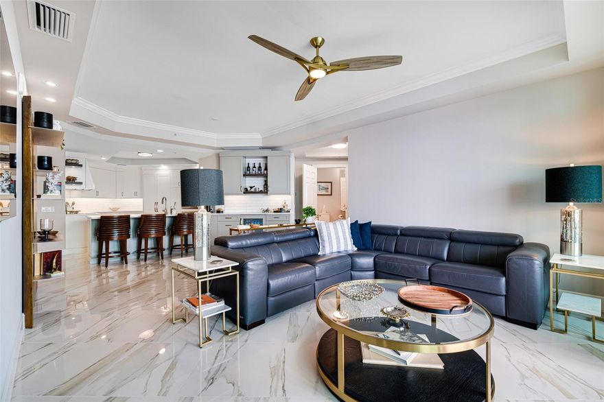 Checkout the Virtual Tour & 3D Matterport Tour!! St. Tropez is a financially healthy community that has completed their Engineered Reserve/Milestone Study and the Reserves are fully funded with no deferred maintenance which means this condo could be easily financed. This luxury, turnkey waterfront condo has breathtaking river & sunset views from every room and the best part? This 3 bedroom, 2 bathroom condo has gone through a complete HIGH END, EXQUISITE REMODEL with Progressive Design Build which saves ANY hassle for the new homeowner as it is not easy to remodel a 14th floor condo! Nothing went unfinished including a BRAND NEW AC and HOT WATER HEATER. As you step out of your private elevator into your private foyer, you are immediately greeted with luxury at every turn, featuring top-tier finishes, an open-concept design, and floor-to-ceiling windows that frame mesmerizing views of the Caloosahatchee River. The chef’s kitchen is a masterpiece, boasting custom cabinetry, premium granite countertops, and high-end appliances. The spacious living area flows seamlessly onto the private balcony, the perfect setting to unwind and take in unforgettable sunsets. Positioned on the NW-facing side, this stunning unit is bathed in gorgeous natural light throughout the day while avoiding the intense summer heat—offering comfortable, year-round enjoyment. The primary suite is a serene retreat with impact sliders showcasing the stunning river from your bed and complete with a spa-inspired ensuite bathroom, dual vanities, and a walk-in closet with custom shelving. Two additional bedrooms provide ample space for guests or a home office, ensuring both comfort and versatility. Both guest rooms also have stunning views of the river, the front guest room has private access to the screened in patio, and the back guest room offers a walk-in closet with custom shelving and private access to the guest bathroom. Enjoy resort-style amenities including a fitness center, waterfront heated infinity pool and spa, tennis, pickleball, billiards, theater room, party room, conference rooms, library, secured bike storage, kayak storage and lift, secure parking and additional a/c'd storage. You are just a short stroll to the Historic River District of Downtown Fort Myers where dining, art, theaters, shopping, festivals and the Caloosa Sound riverfront Amphitheater await you. You are also only 4 miles to I-75, 16 miles to SWFL International Airport, 17 miles to Fort Myers Beach, and 24 miles to Sanibel. Don’t miss the opportunity to own one of the most desirable units in St. Tropez—where luxury meets lifestyle! Schedule your private tour today! WE WELCOME BUYER AGENTS!!