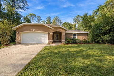 Photo of 9636 N Quarry Dr, Citrus Springs, FL 34434 (MLS # TB8562778)