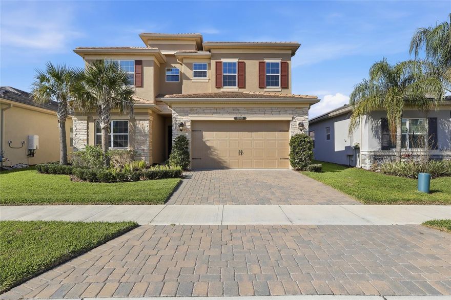 One or more photo(s) has been virtually staged. Located in the gated, CDD-free Winding Ridge community of Wesley Chapel, this spacious 5-bedroom, 5-bathroom residence offers a functional floor plan with multiple living areas and approximately 3300 square feet of living space designed for both everyday living and entertaining.

A grand foyer welcomes you into the home and leads to the open-concept main living area. The kitchen, dining, and family room flow seamlessly together, creating a spacious gathering space filled with natural light. The kitchen features a large center island, breakfast area, abundant cabinetry, and ample storage, while large windows throughout the home provide views of the outdoor living areas.

The flexible layout includes multiple living and dining spaces, offering versatility for a variety of lifestyles. All bedrooms are generously sized, and the home's thoughtful design provides both privacy and functionality.

Winding Ridge is a 24-hour guard-gated community offering an extensive collection of amenities, including a clubhouse with event space, fitness center, indoor basketball court, resort-style swimming pool, splash park, playground, picnic areas, tennis courts, pickleball courts, and outdoor basketball facilities. The community also hosts a variety of resident activities and events throughout the year.

Conveniently located near I-75, the property offers easy access to shopping, dining, medical facilities, and entertainment destinations including Tampa Premium Outlets, The Shops at Wiregrass, KRATE at The Grove, and other Wesley Chapel amenities.

This home offers a desirable combination of space, community amenities, and a convenient location in one of Wesley Chapel's established gated communities. Schedule your private showing today.