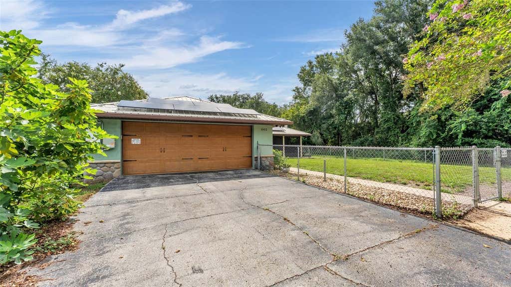 Photo of 1002 W Lake Marion Road, Haines City, FL 33844 (MLS # TB8541871)