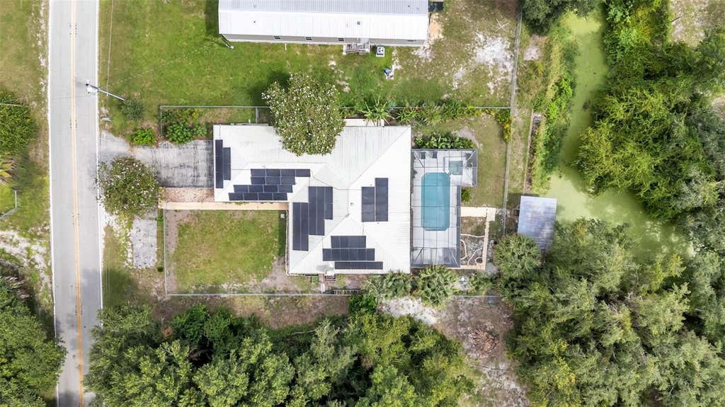 Photo of 1002 W Lake Marion Road, Haines City, FL 33844 (MLS # TB8541871)