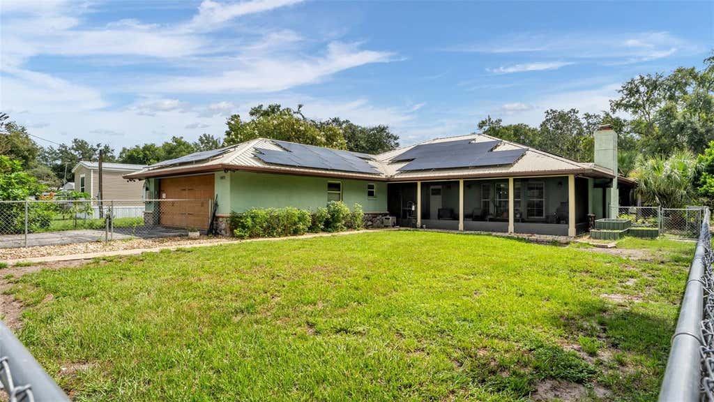Photo of 1002 W Lake Marion Road, Haines City, FL 33844 (MLS # TB8541871)