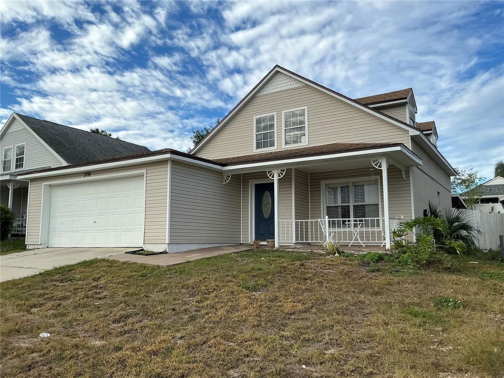 Photo of 3791 Huntwicke Boulevard, Davenport, FL 33837 (MLS # O6363965)