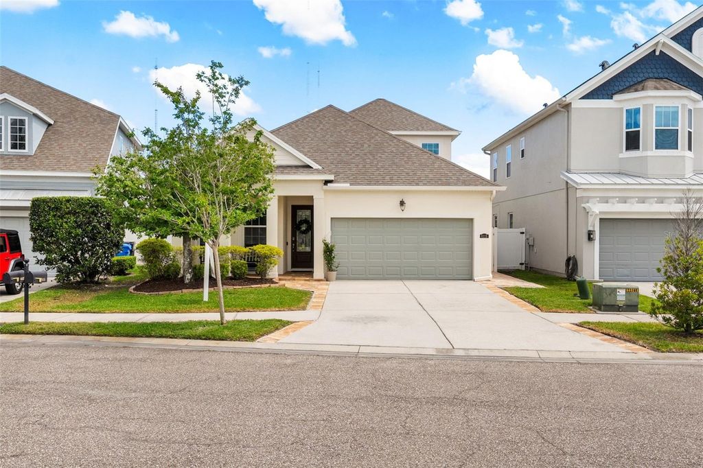 Photo of 8115 Champions Forest Way, Tampa, FL 33635 (MLS # TB8494727)