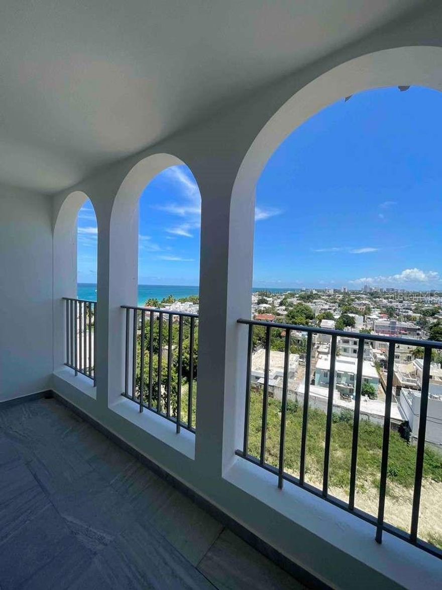 A striking, fully remodeled sub-penthouse just steps from the beach —a true gem in the heart of Condado.
This two-level residence features 3 bedrooms, 2.5 bathrooms, and approximately 1,750 sq. ft. of thoughtfully designed living space. Enjoy elegant modern finishes, abundant natural light, and refreshing ocean views from multiple rooms.

Move in ready, the home includes all essential appliances and offers one covered parking space. Located on the gated Carrion Court Street, the building provides a full power generator, water cistern, and effortless access to the beach, shopping, dining, and Condado’s vibrant lifestyle.

An exceptional opportunity to own a beautifully renovated sub-penthouse in one of San Juan’s most desirable coastal neighborhoods.