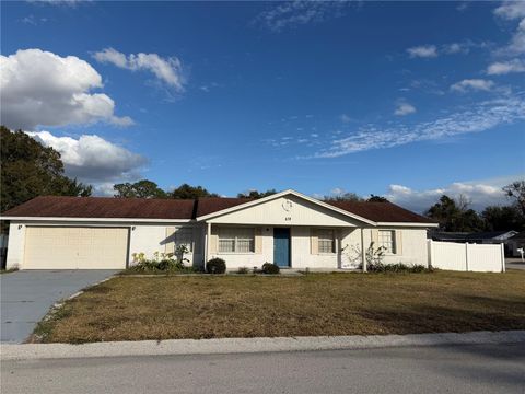 Photo of 878 Killearn Boulevard, Winter Haven, FL 33880 (MLS # O6377826)
