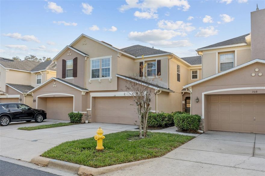 Nestled in the quaint GATED community of Orchard, this spacious townhome offers comfort, style, and convenience. Location is superb. Within minutes to Downtown Winter Garden Shoppes and eateries and within a mile Winter Garden Village and all of the MAJOR arteries. This townhome is in a quiet area of the community w/ no rear neighbors and walking distance to the sparkling community pool. Once inside, high ceilings welcome you to a very open and bright floorplan. The ENTIRE Interior has just been repainted and refreshed, while the kitchen boasts granite countertops and wood cabinetry with eating space in kitchen. A powder bath located on 1st floor. Once Upstairs, you'll find 2 lovely secondary bedrooms and guest bath, one with walk-in closet AND generous sized Master Bedroom that overlooks the conservation area with an ensuite Master bath with double sinks, solid surface countertops, garden tub and walk-in shower. This home is ready for its new owners. HOA covers the Exterior of home, lawn maintenance, and common areas too.