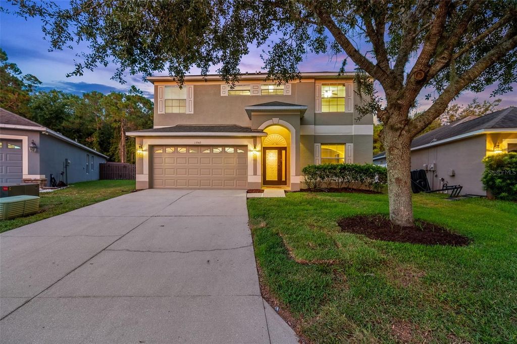 Photo of 13943 Caden Glen Drive, Hudson, FL 34669 (MLS # TB8411279)