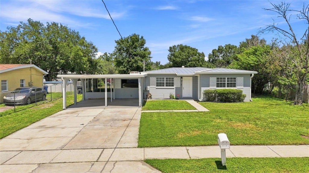 Photo of 8326 Endive Avenue, Tampa, FL 33619 (MLS # TB8549593)